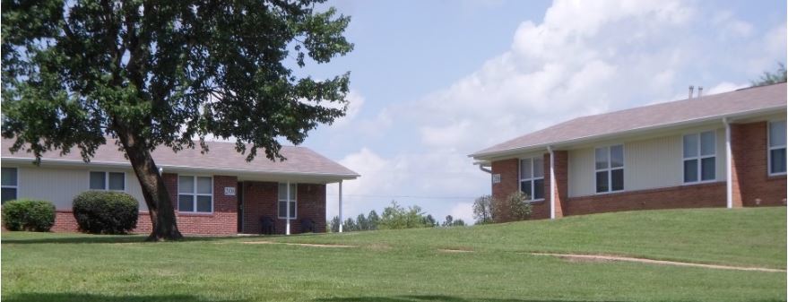 Two of the Center Point Apartment buildings are sitting side by side. 