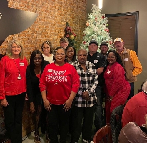 The attendees of the Christmas party.