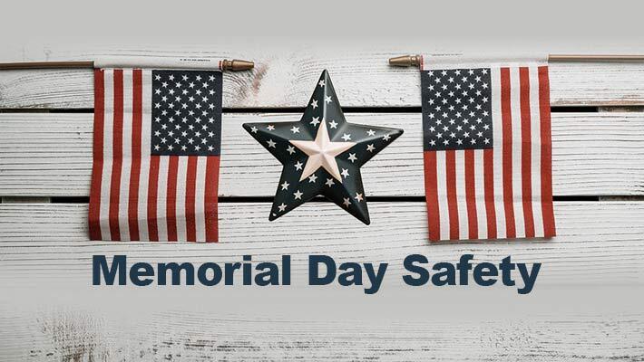 Memorial Day Safety. A star between two American Flags.